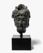 Länder und Kontinente. Kopf eines Bodhisattva
