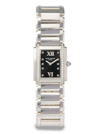 Patek Philippe "Twenty-4" - фото 1