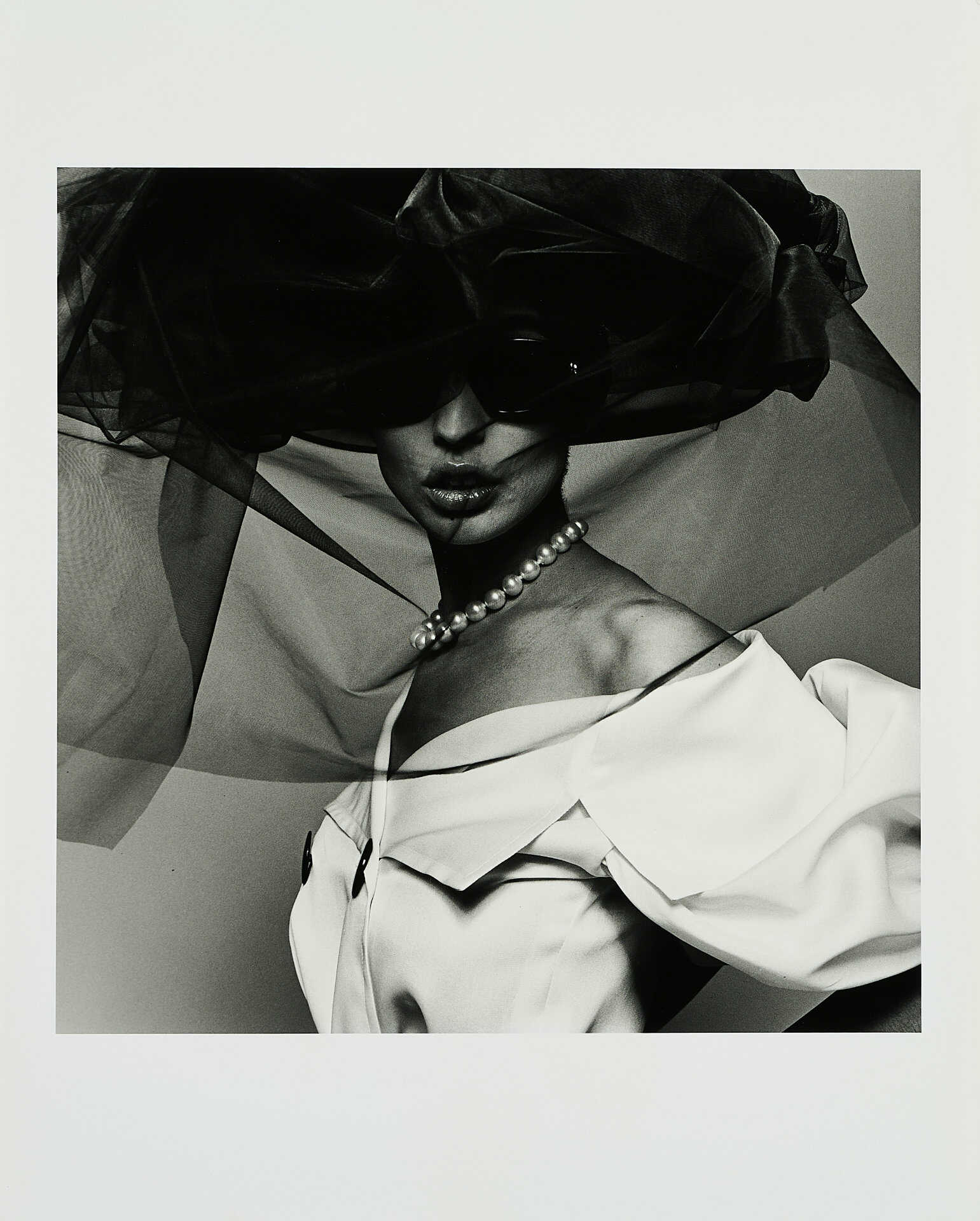 Michel Comte. Fashion with Veil and Pearl Necklace