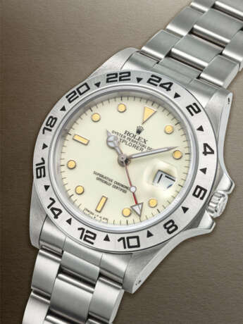 ROLEX, VERY RARE STAINLESS STEEL DUAL TIME 'EXPLORER II' WITH CREAM 'RAIL' DIAL AND DATE, REF. 16550 - photo 2 ROLEX, VERY RARE STAINLESS STEEL DUAL TIME 'EXPLORER II' WITH CREAM 'RAIL' DIAL AND DATE, REF. 16550 - photo 2