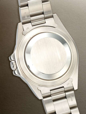 ROLEX, VERY RARE STAINLESS STEEL DUAL TIME 'EXPLORER II' WITH CREAM 'RAIL' DIAL AND DATE, REF. 16550 - photo 3 ROLEX, VERY RARE STAINLESS STEEL DUAL TIME 'EXPLORER II' WITH CREAM 'RAIL' DIAL AND DATE, REF. 16550 - photo 3