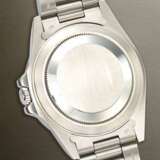 ROLEX, VERY RARE STAINLESS STEEL DUAL TIME 'EXPLORER II' WITH CREAM 'RAIL' DIAL AND DATE, REF. 16550 - photo 3
