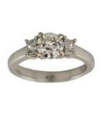 Overview. 750 gold ring in Art Deco style with three diamonds. 