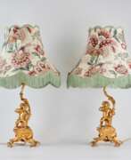 Bronze doré. Paire de lampes de table Putti