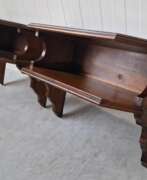 Catalogue des produits. A pair of wall consoles