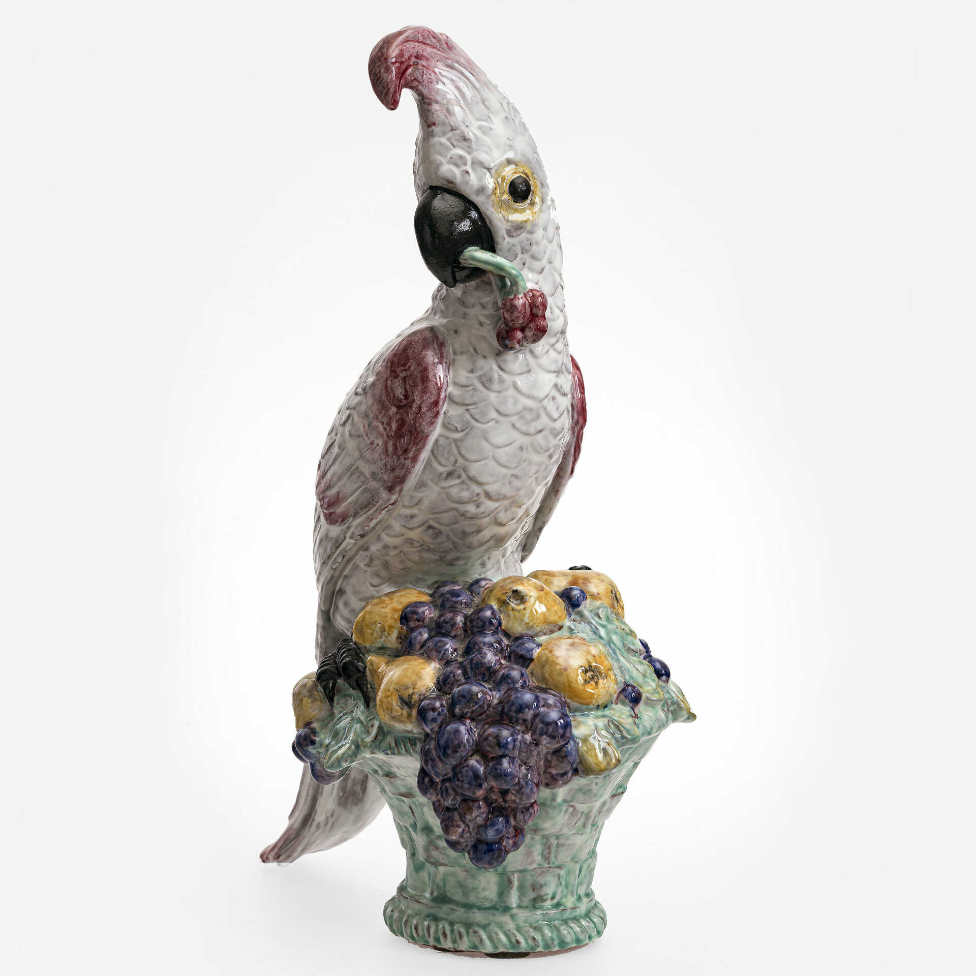 A parrot with cherry. Nymphenburg, 20th century, design by Josef Wackerle, 1909