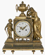 Watches. A mantle clock. France/Austria, 19th century