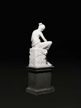 A WHITE MARBLE FIGURE OF THE SANDAL BINDER (SANDALBINDERIN) - photo 5