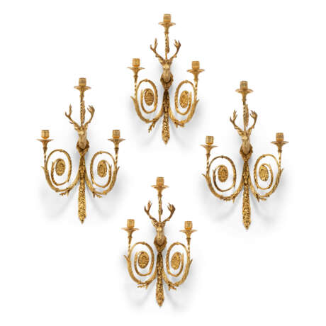 A SET OF FOUR LOUIS XVI ORMOLU THREE-LIGHT WALL-LIGHTS - photo 1