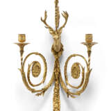 A SET OF FOUR LOUIS XVI ORMOLU THREE-LIGHT WALL-LIGHTS - photo 2