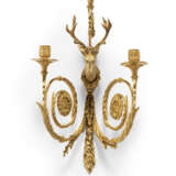 A SET OF FOUR LOUIS XVI ORMOLU THREE-LIGHT WALL-LIGHTS - photo 3