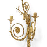A SET OF FOUR LOUIS XVI ORMOLU THREE-LIGHT WALL-LIGHTS - photo 6