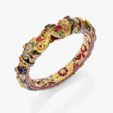 A bangle with dragon heads and diamonds, rubies, and enamel. India - photo 1