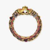 A bangle with dragon heads and diamonds, rubies, and enamel. India - photo 2