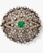 Dress jewellery. An emerald and diamond brooch. Germany, late 19th century