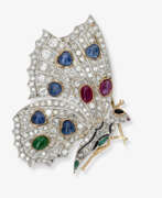 Dress jewellery. An expressive butterfly brooch decorated with diamonds, sapphires, rubies, and emerald cabochons. Argentina or America, 1920s - 1930s