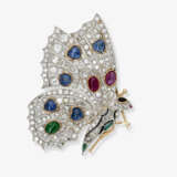 An expressive butterfly brooch decorated with diamonds, sapphires, rubies, and emerald cabochons. Argentina or America, 1920s - 1930s - photo 1