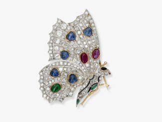 Ausdrucksvolle Schmetterlings - Brosche verziert mit Diamanten sowie mit Saphir, Rubin und Smaragd - Cabochons. Argentinien oder Amerika 1920er - 1930er Jahre