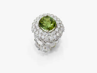 A ring with peridot and diamonds.