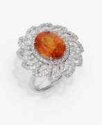 Ringe. Ring mit Spessartin und Diamanten.