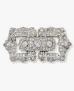 Dress jewellery. A historic plique brooch decorated with different diamond shapes. Argentina, Art deco, 1920s - 1930s
