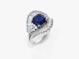 A ring with fine sapphire and diamonds.