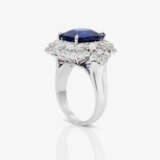 A ring with sapphire and diamonds. - фото 3