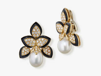 Floral cocktail-style clip earrings decorated with South Sea cultured pearls, brilliant-cut diamonds, and black enamel. Probably Czechoslovakia, 1980-1990s