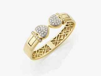 A bangle with heart-shaped ends.