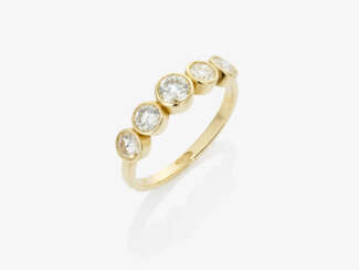 An eternity ring decorated with brilliant-cut diamonds. Germany, 2000s.