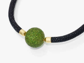 A black ray leather necklace with interchangeable chrome diopside clasp. 20th/21st century
