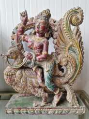 An Indian deity decorated with fine carvings