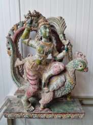 An Indian deity decorated with fine carvings