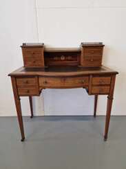 A small, beautiful desk with inlays