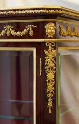 Showcase in mahogany and gilded bronze in Sormani style. France 19th century.