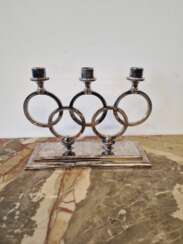 Candlestick with the Olympic symbol