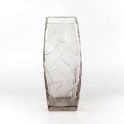 Large, heavy, crystal vase with luxurious irises. 