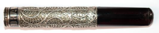 Zigarettenspitze, Silber, ca. 24 g, filigran gearbeitet, sign. Kavkas, L. 10 cm - Auktionspreise