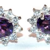 Ohrstecker, 375er GG/WG, 9 k., Amethyste und weiße Zirkonia im Brillantschliff, Maße ca. 10 x 7 mm - photo 1