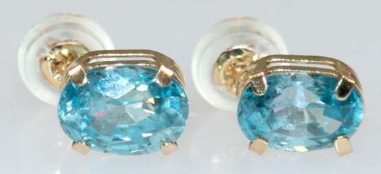 Ohrstecker, GG 14 kt., Blautopase, ca. 7 x 5 mm, Silikonaufstecker mit Goldinlay - photo 1
