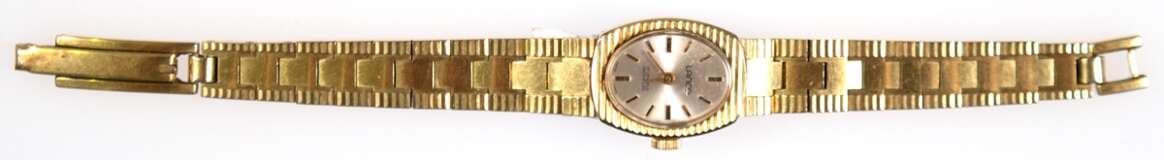 Damen-Armbanduhr "Lanco", Handaufzug, 17 Jewels, Incabloc, Swiss made, ovales perlmuttfarbenes Zifferblatt mit Stabindizes, gangfähig, goldfarbenes Gehäuse, 2,2x1,8 cm, Gliederarmband, L. 16 cm - photo 1