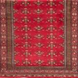 Teppich, rotgrundig, ornamental gemustert, Kanten belaufen, 180x133 cm - photo 1