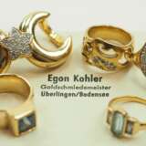Vier Ringe und Halstuchschließe. - фото 1