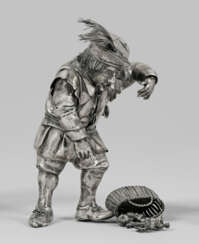 Mann mit Fruchtkorb und Skorpion Silber. Figur ein…
