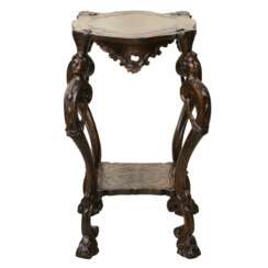 Carved wooden table in neo-Rococo style from the turn of the 19th century.