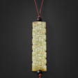 A WELL-CARVED GREYISH-GREEN JADE RECTANGULAR BEAD - Сейчас на аукционе