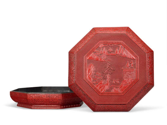 A LARGE CARVED RED LACQUER OCTAGONAL BOX AND COVER - photo 1