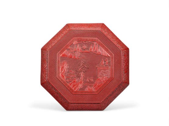 A LARGE CARVED RED LACQUER OCTAGONAL BOX AND COVER - photo 2