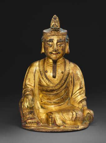 A GILT-BRONZE SEATED FIGURE OF GUANYIN - photo 1