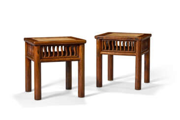 A RARE PAIR OF HUANGHUALI STOOLS